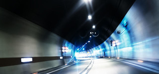 隧道灯光远近全国交通安全日背景模板